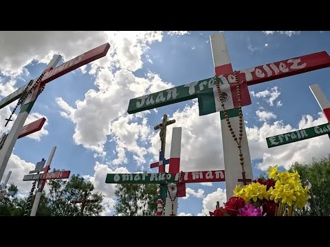 Community gathers for vigil to honor the 53 human smuggling victims killed on Quintana Road