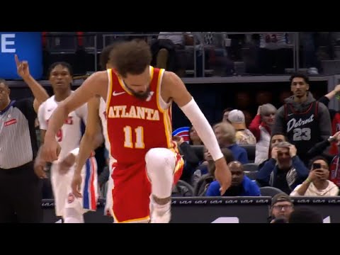 Trae Young steps over Malik Beasley after hitting GAME WINNER over him vs Pistons