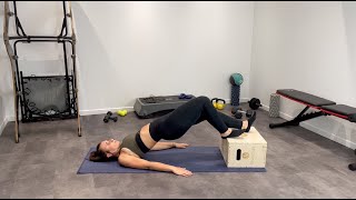Feet Elevated Staggered Glute Bridge