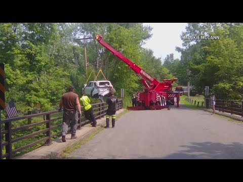 YouTube video thumbnail: Car Goes off Road Into Creek in Angola
