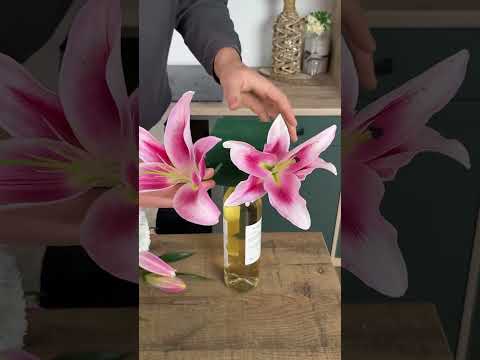 Wine surprise wrapped into flower bouquet #creative #wine #flowerbouquet #gift