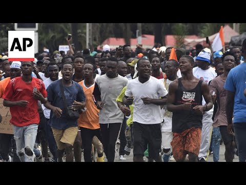 YouTube video thumbnail: Thousands in Ivory Coast Protest Exclusion of Opposition Leaders From Election