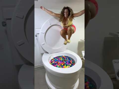 Big JUMP into the Worlds Largest Toilet with SURPRISE EGGS and a SPLASH #shorts