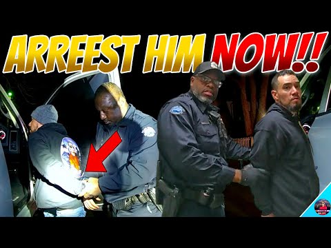 Lawless Cop Drives Recklessly With Man in Custody!