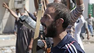 YouTube video thumbnail: Mass Prison Escape as Armed Clashes Rock Western Libya