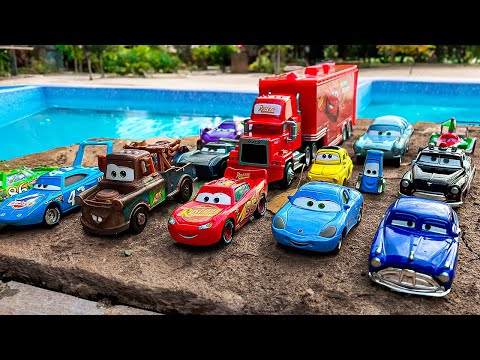 Disney Pixar Cars falling into deep pool, Lightning McQueen, Tow Mater, Mack, Sally, Francesco