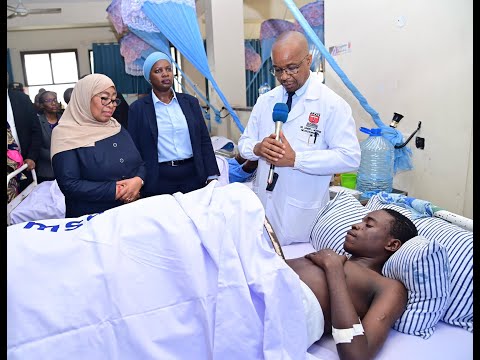 MUHIMBILI : RAIS DKT  SAMIA AKITEMBELEA  WALIOPATA  MAJERUHI WA AJALI YA KUPOROMOKA KWA GHOROFA