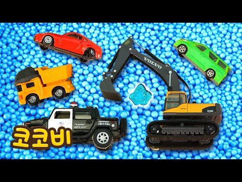 The Excavator and Police Car Fall Into a Ball Pit! Cocobi Car Toys