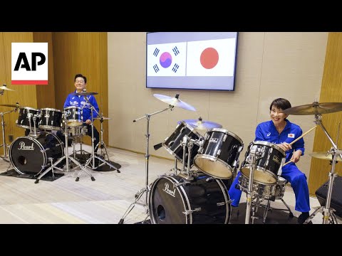 YouTube video thumbnail: Japanese and South Korean Leaders jam to K-pop Hits at a Summit