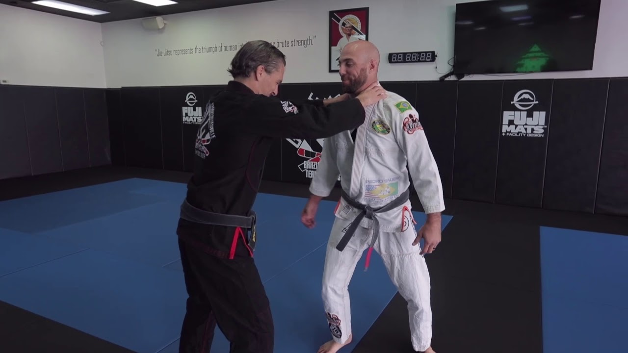 Two-hand front choke defense (with hip throw)