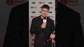 Chase Matthew receives his iHearRadio On The Verge Artist Trophy on the red carpet!