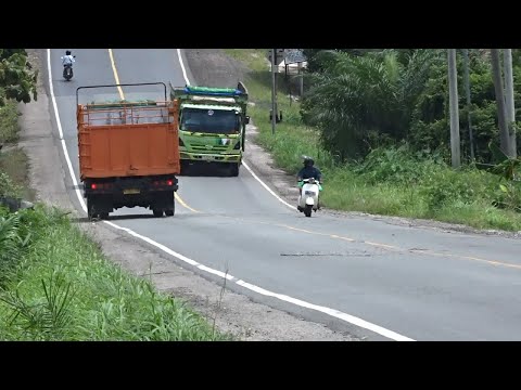 Old Vespa Power - Vespa and Cargo Truck Climbing High Hill