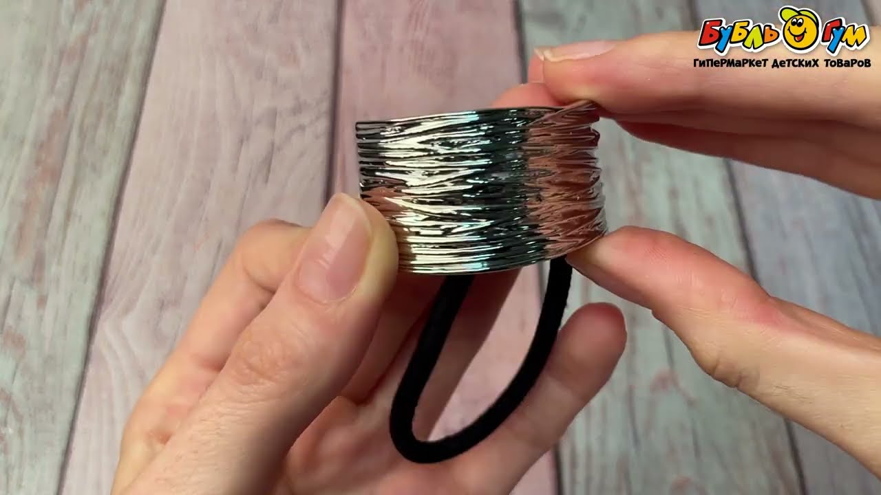 Резинка для волос рельефная в серебристом цвете - видео Резинка для волос рельефная в серебристом цвете - видео