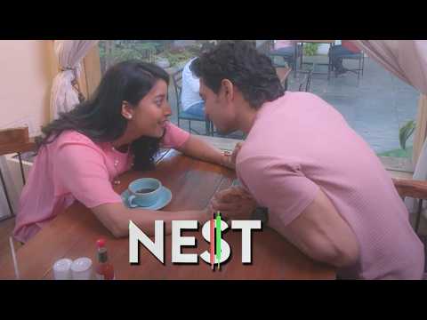 Nest -  He’s invested in profits; she’s ready to invest in true love.