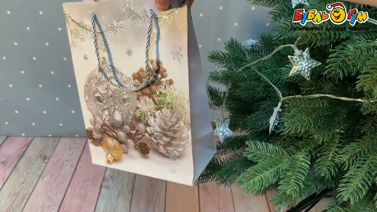 Пакет подарочный с Новым Годом серебро 24х18х10см в ассортименте  - видео Пакет подарочный с Новым Годом серебро 24х18х10см в ассортименте  - видео