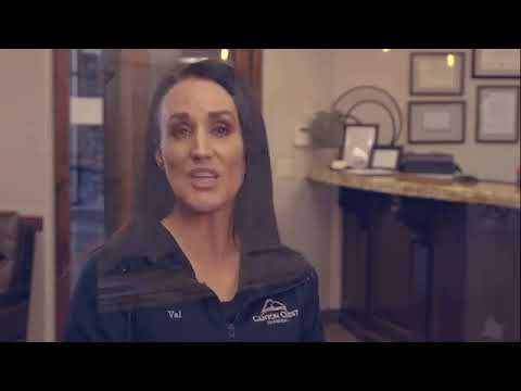 Woman speaking in an office setting.