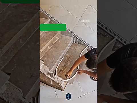 This guy is a genius, the owner of the house paid him $250 to cover a staircase with ceramic tiles