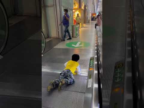 3 years old beautiful baby falls on Escalator and no body cares for him🤦 #trending #airport #viral