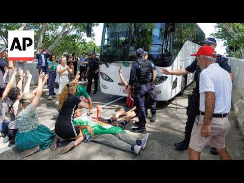 YouTube video thumbnail: Protesters Block Bus Believed to Be Carrying Iran Women's Soccer Team in Australia
