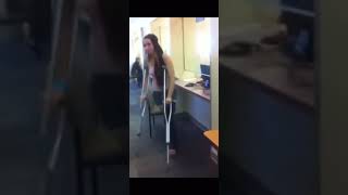 Girl having broken leg in LLC and crutches