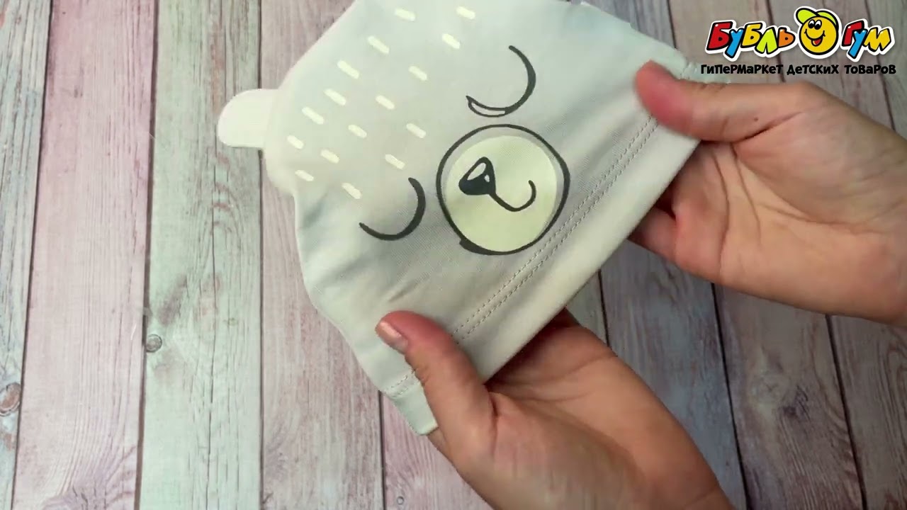 Шапка Bebetto с изображением медвежонка в нежном сером цвете - видео Шапка Bebetto с изображением медвежонка в нежном сером цвете - видео