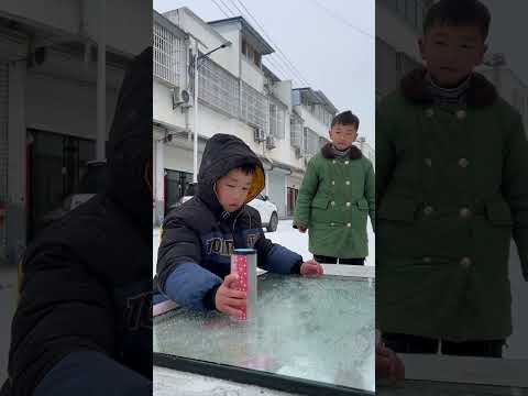Little boy shakes dice to prepare for world record