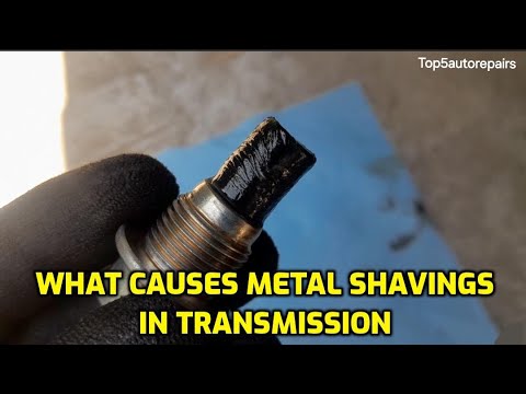 WHAT CAUSES METAL SHAVINGS IN TRANSMISSION OIL PAN OR ON DRAIN PLUG