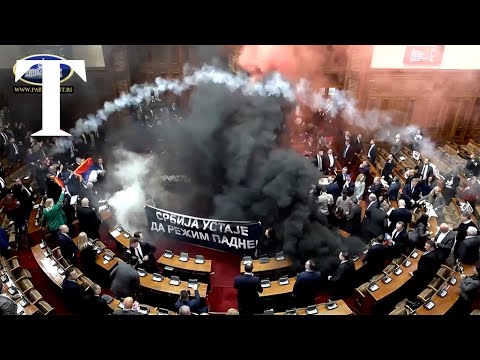 Smoke grenades thrown in Serbian parliament by angry opposition MPs