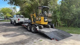 Buying a cheap Mini Excavator from auction to fix up my property. 