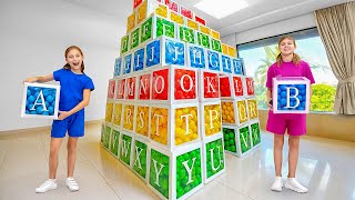 Play and build ABC Playhouse with colored balls