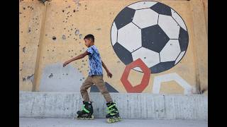 YouTube video thumbnail: Gazans Watch World Cup Amid Ruins, Drones and Fear