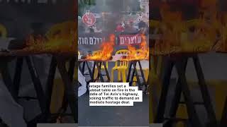 Hostage families set Shabbat table ablaze on Tel Aviv highway in desperate protest