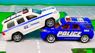 The police car helps the ambulance and other cars