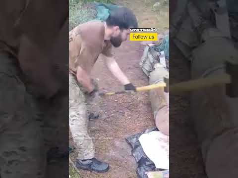 Ukrainian Soldier Removes Explosives From Russian Bomb With a Hammer #warinukraine