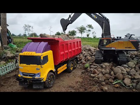 MOBIL TRUK CANTER MUATAN BATU - EXCAVATOR BEKO KERUK