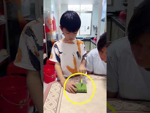 This boy helps his mom.