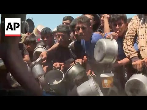 YouTube video thumbnail: Charity Distributes Soup to Thousands Displaced in Gaza's Deir al-Balah