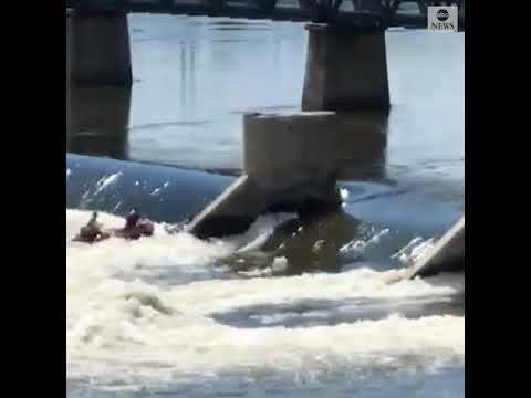 Firefighters rescue person clinging to low water dam on Arkansas River in Tulsa, Oklahoma | ABC News