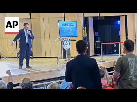 YouTube video thumbnail: 'Tax the Rich': Nebraska Republican Mike Flood Booed at Town Hall