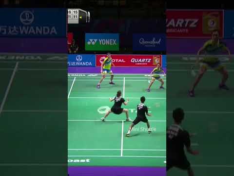 Badminton players switch racket during rally #shorts #badminton