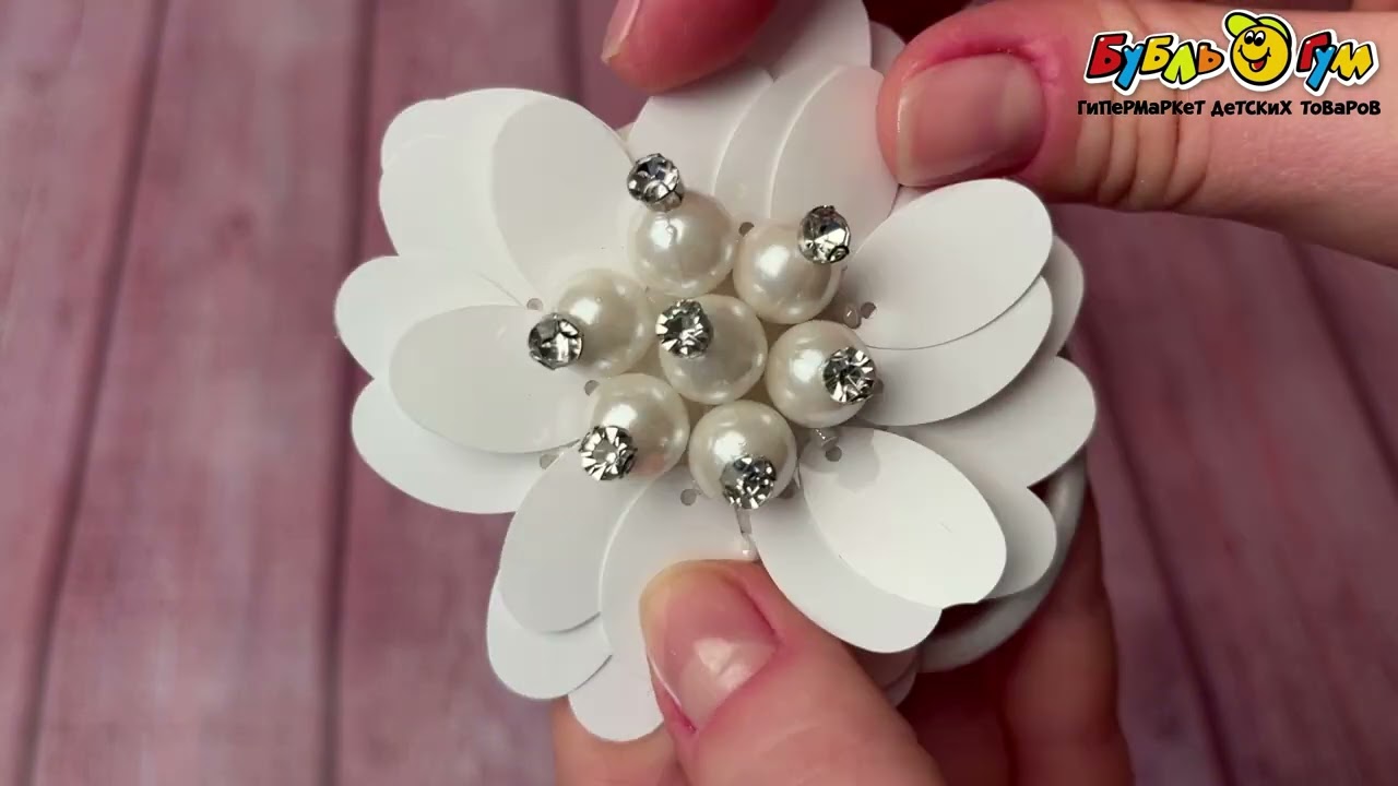 Резинка жемчужный цветок с блестками - видео
