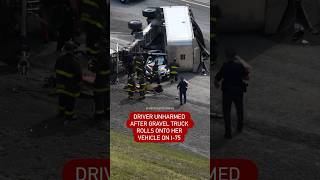 Driver unharmed after gravel truck rolls onto car