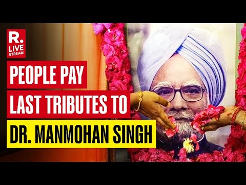 People Gather To Pay Their Tributes To Late PM Dr. Manmohan Singh At His Residence