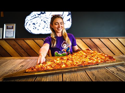 No Woman Has Ever Finished Australia's Biggest Pizza Slice | George's "Big Slice" Pizza Challenge