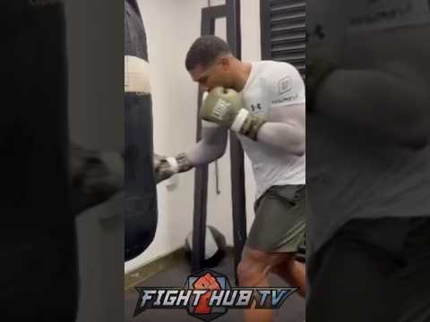 Anthony joshua pounds heavy bag in camp!