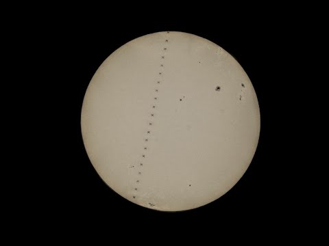 Half-second image: China Space Station flashes past the sun