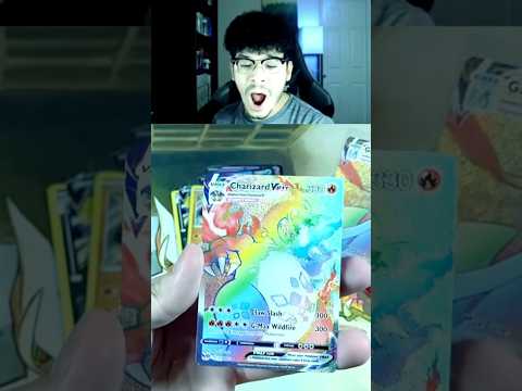 I PULLED THE SECRET RARE RAINBOW CHARIZARD POKEMON CARD!