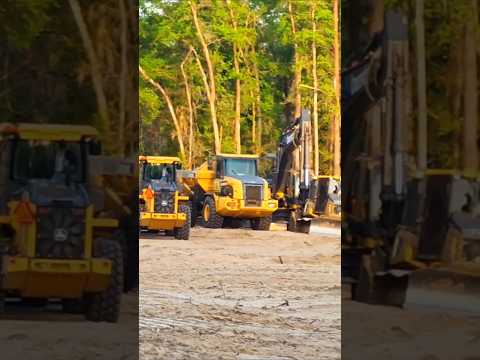 construction vehicles at the construction site john deere CAT