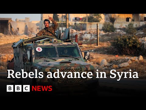 Thousands flee Syrian city Homs as rebels advance further | BBC News