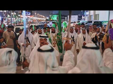 Crowds celebrate Saudi National Day with flags, performances and military parade